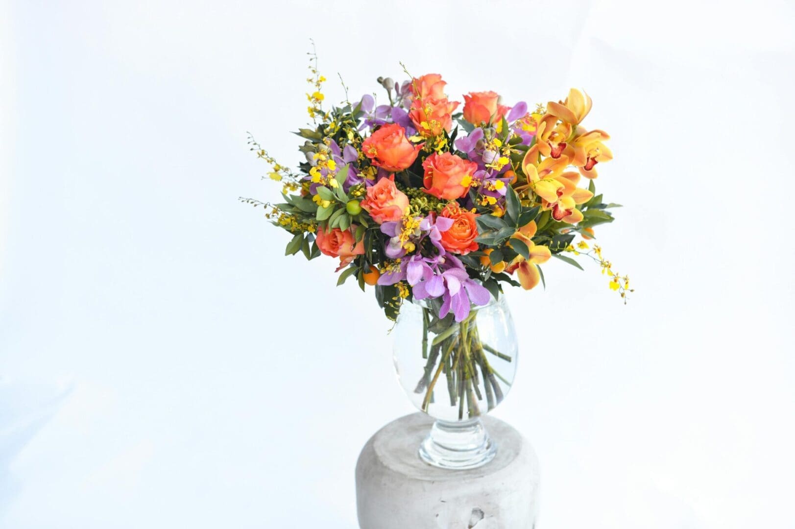 A vase filled with flowers on top of a table.